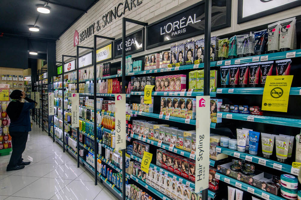 A section of a Caring pharmacy is seen in Kuala Lumpur June 4, 2021. The non-essential sections which selling hair colours, suncare, facial masks and men’s hair gel are closed due to the Full Movement Control Order (FMCO). — Picture by Firdaus Latif