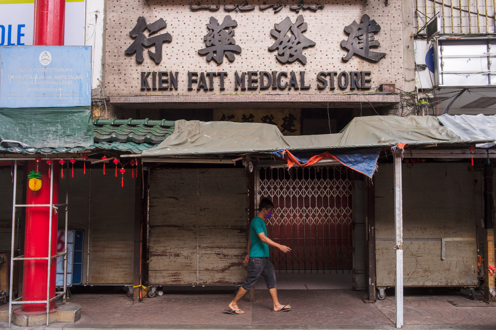 This traditional Chinese medicine shop in Petaling Street was closed, while most of the stalls and shops along the street were also closed. — Picture by Shafwan Zaidon