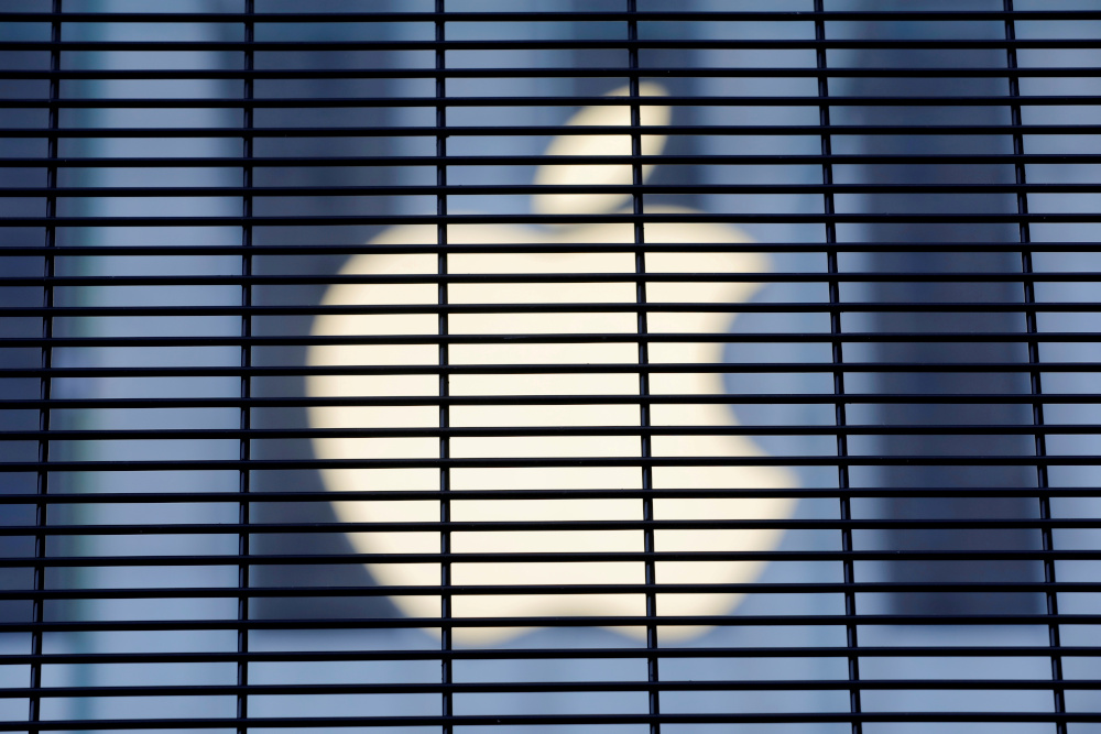 The Apple logo is seen through a security fence erected around the Apple Fifth Avenue store in Manhattan, New York City, US, November 5, 2020. u00e2u20acu201d Reuters picnn