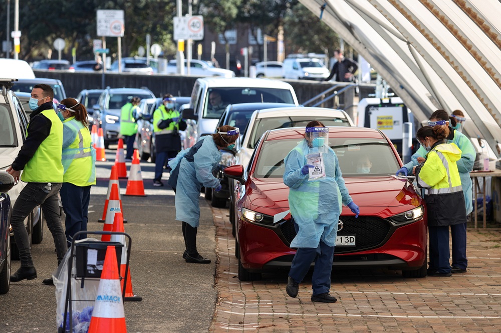 Medical workers administer tests at the Bondi Beach drive-through Covid-19 testing centre in the wake of new positive cases in Sydney, Australia June 17, 2021. u00e2u20acu2022 Reuters pic