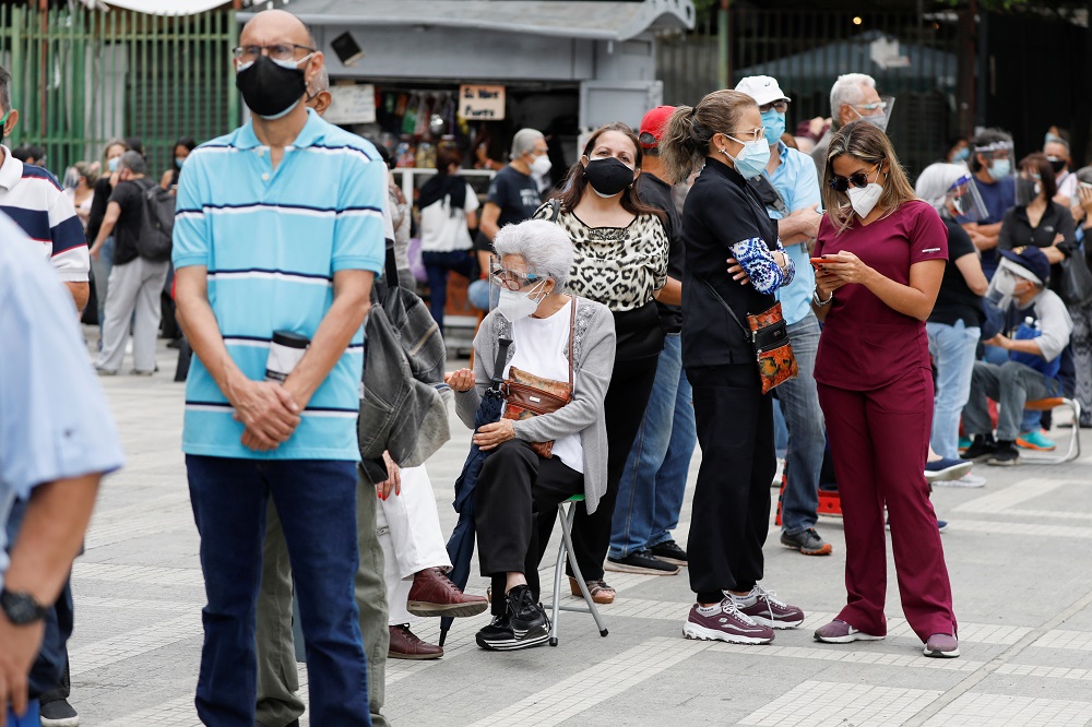 Senior citizens and health workers wait to receive their first dose of Russia's Sputnik V vaccine against Covid-19, outside the hotel Alba Caracas, which was turned into a mass vaccination centre, in Caracas, Venezuela May 31, 2021. u00e2u20acu2022 Reuters pic