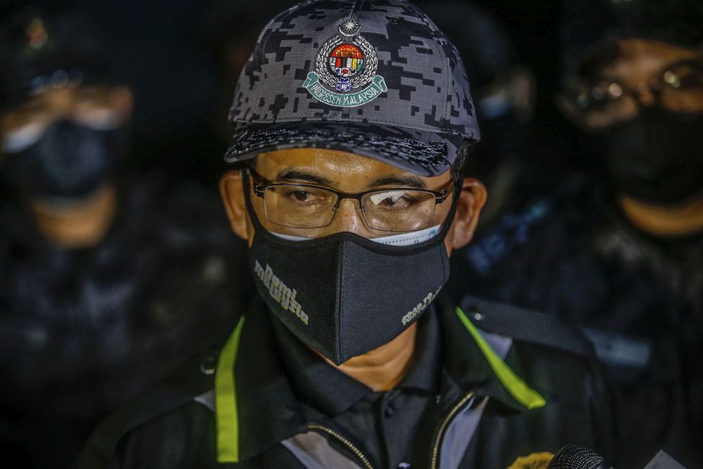 Immigration Department director-general Datuk Indera Khairul Dzaimee Daud addresses media during a raid on a construction site in Cyberjaya June 6, 2021. u00e2u20acu201d Picture by Hari Anggara