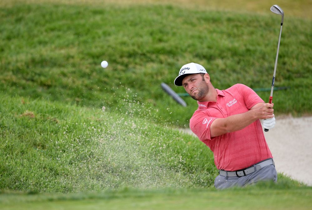 Jon Rahm plays a shot from a bunker on the 11th hole during the final round of the US Open golf tournament at Torrey Pines Golf Course, San Diego June 20, 2021. — Reuters pic