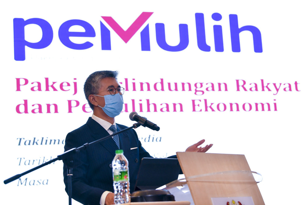 Finance Minister Datuk Seri Tengku Zafrul Abdul Aziz speaks at a press conference on the National People’s Well-Being and Economic Recovery Package (Pemulih) in Putrajaya, June 29, 2021. — Bernama pic