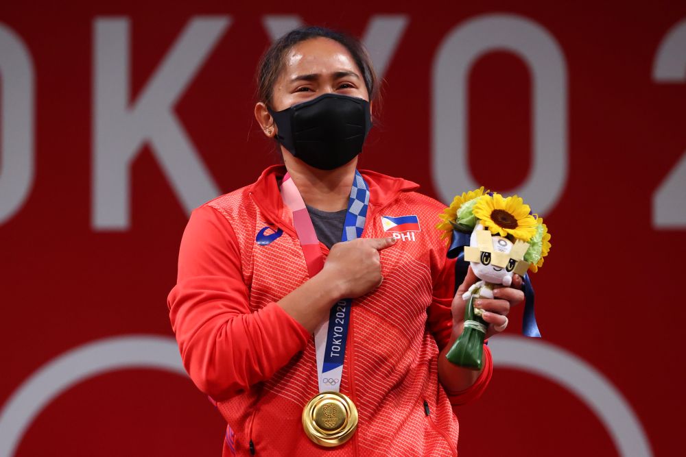 Gold medallist Hidilyn Diaz of the Philippines reacts to her victory at the Tokyo International Forum July 26, 2021. u00e2u20acu201d Bernama picnnn