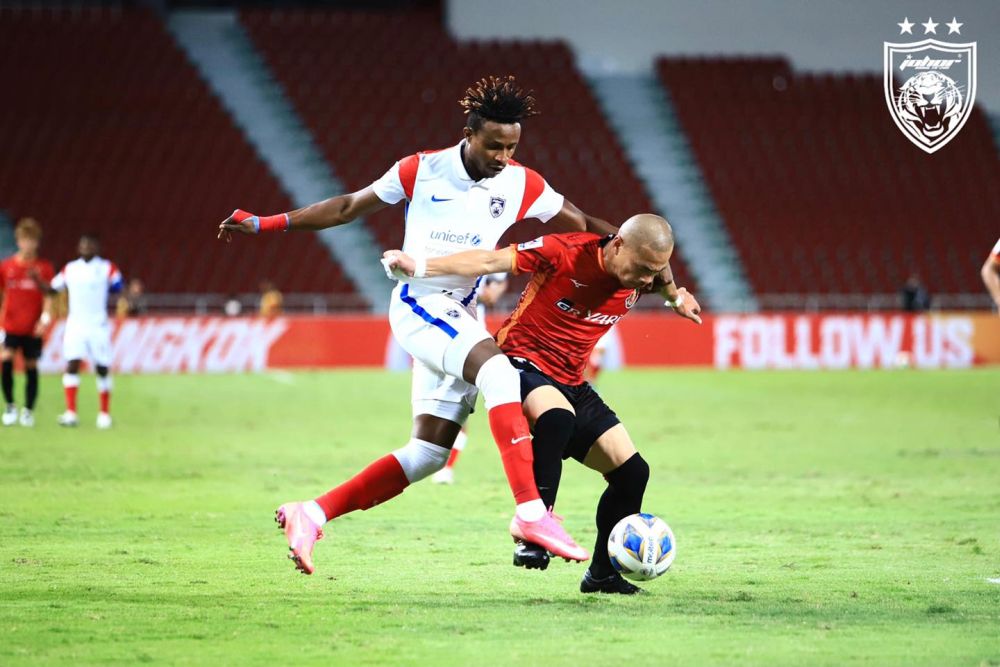 JDTu00e2u20acu2122s Mohamadou Sumareh (left) in action against Nagoya Grampus at the Rajamangala Stadium in Bangkok July 5, 2021. u00e2u20acu201d Picture via Facebook