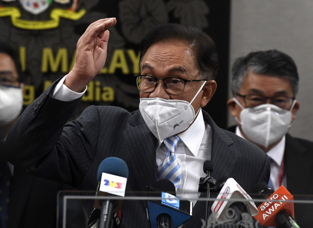 File photo of opposition leader Datuk Seri Anwar Ibrahim speaking at a press conference at Parliament lobby, July 29, 2021. — Bernama pic