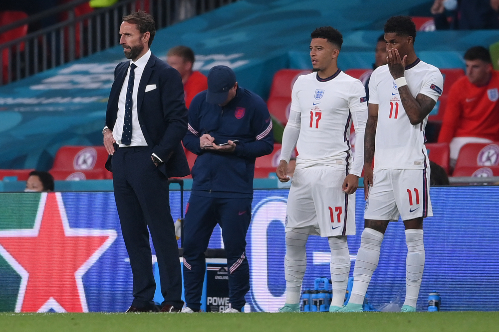 England coach Gareth Southgate stands next to forwards Jadon Sancho and Marcus Rashford during the Uefa Euro 2020 final football match between Italy and England at the Wembley Stadium in London July 11, 2021. u00e2u20acu201d AFP pic 