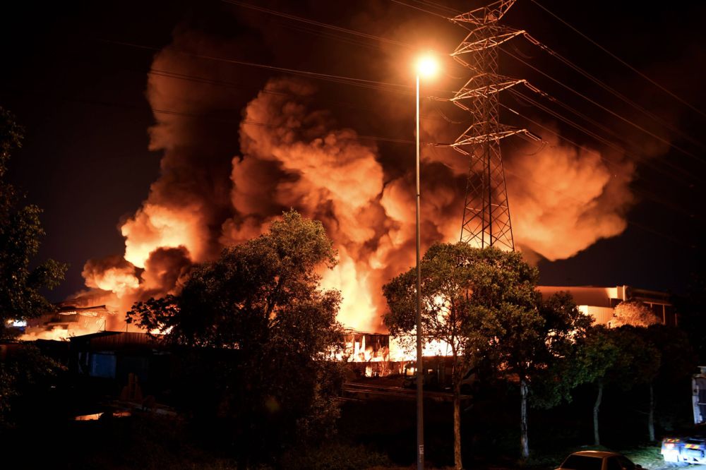 A plastic recycling factory is seen on fire in the Bandar Sultan Sulaiman industrial area, Port Klang August 11, 2021.u00e2u20acu2022 Bernama pic