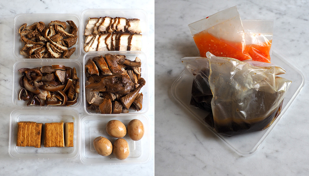 The braised items are neatly placed in boxes, making it easy to eat just as is (left). You are given the braising liquid and an appetising chilli garlic dip with vinegar too (right).