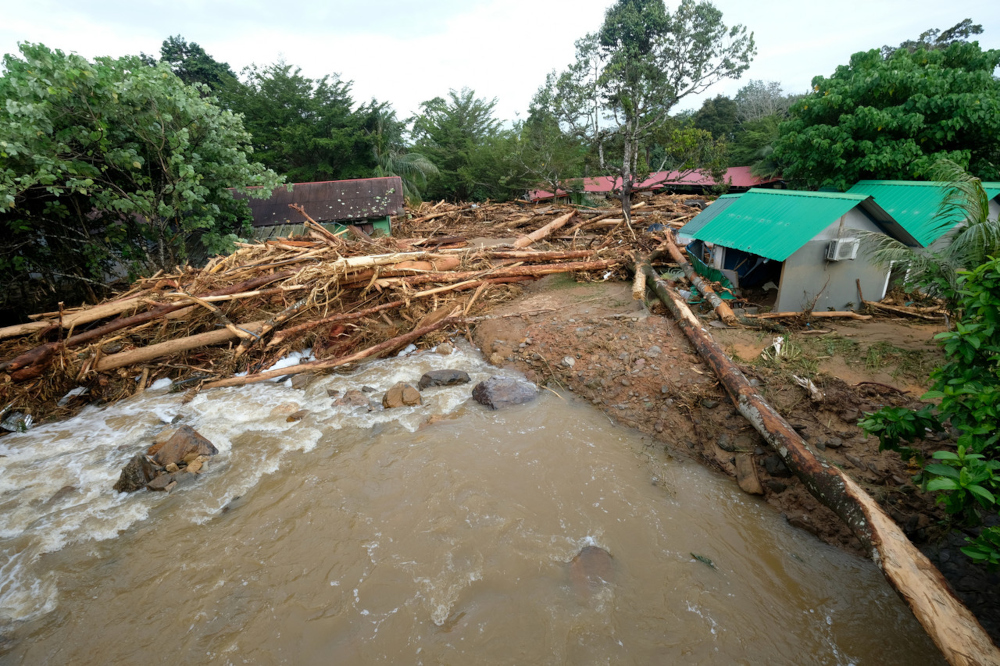 Damaged chalets are pictured  near Titi Hayun following flash floods in Yan, Kedah August 19, 2021. u00e2u20acu201d Bernama pic