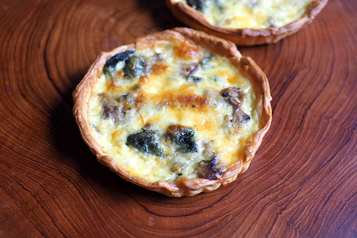 Their vegetarian quiche has a crisp, crunchy shell that is filled with sliced mushrooms and spinach