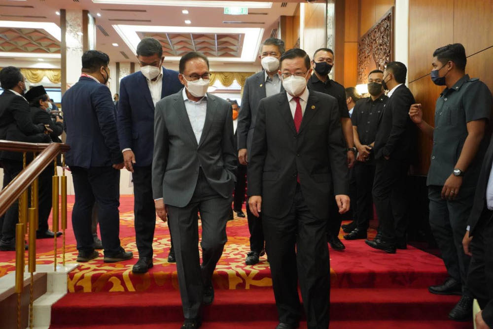 Pakatan Harapan (PH) chairman and PKR president Datuk Seri Anwar Ibrahim and DAP secretary-general Lim Guan Eng  after the official signing ceremony presided by Prime Minister Datuk Seri Ismail Sabri Yaakob in Parliament, September 13, 2021. u00e2u20acu201d Picture f