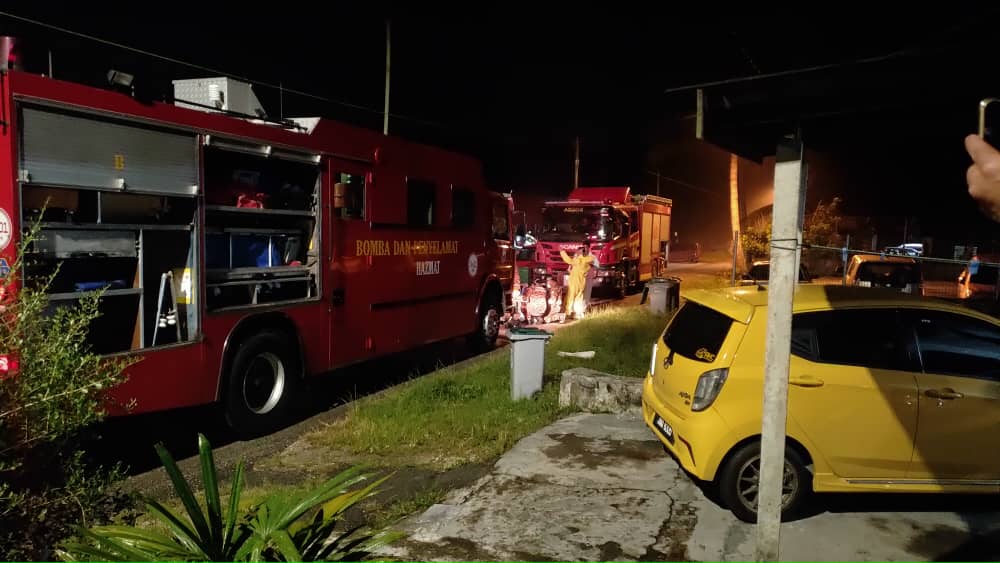 Firemen evacuate residents of Kampung Sri Aman near Seelong after fumes from a chemical spill in a nearby river engulfed the village September 15, 2021. u00e2u20acu201d Picture courtesy of the Johor Fire and Rescue Department