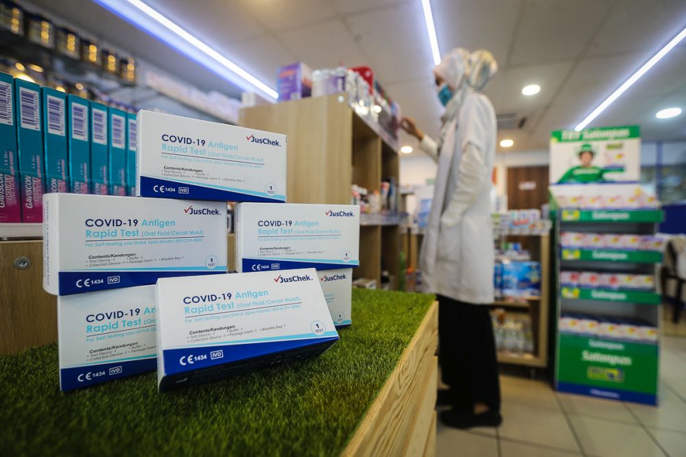 JusChek Covid-19 rapid antigen self-test kits are displayed for sale at a pharmacy in Shah Alam September 2, 2021. — Picture by Yusof Mat Isa