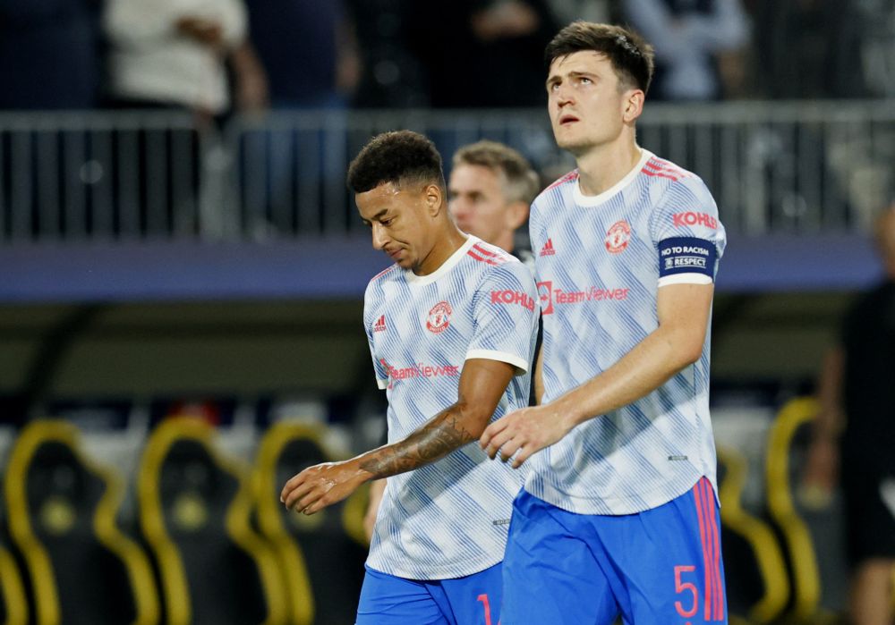 Manchester Unitedu00e2u20acu2122s Jesse Lingard and Harry Maguire look dejected after the match against Young Boys at Stadion Wankdorf, Bern September 14, 2021. u00e2u20acu201d Reuters pic