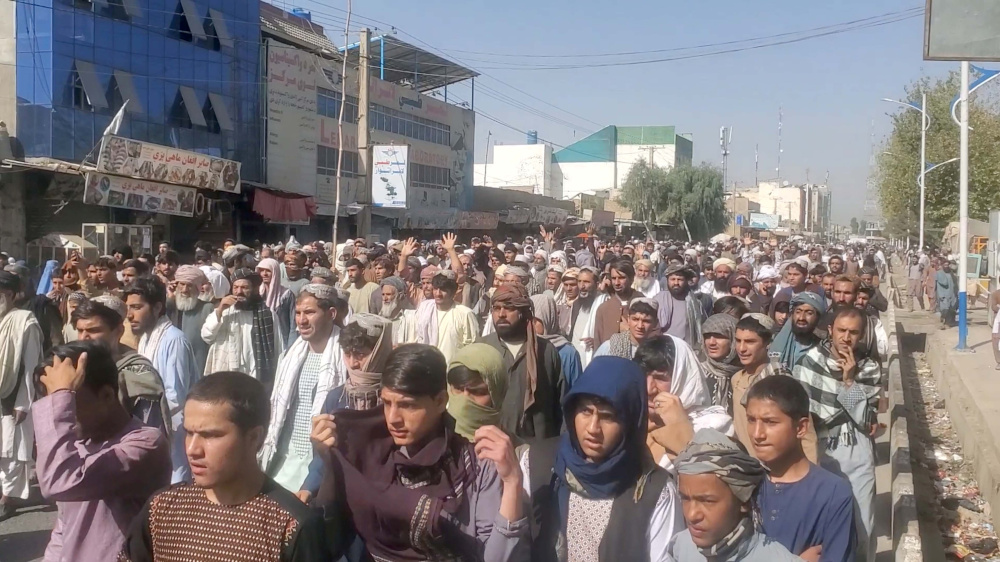 People hold a protest march against the Talibanu00e2u20acu2122s decision to force them to leave their homes in Kandahar, Afghanistan September 14, 2021, in this still image taken from video. u00e2u20acu201d Asvaka News Agency handout pic via Reuters 