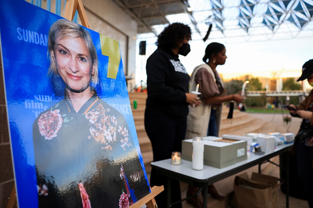 An image of cinematographer Halyna Hutchins, who died after being shot by Alec Baldwin on the set of his movie 'Rust', is displayed at a vigil in her honour in Albuquerque, New Mexico October 23, 2021. — Reuters pic
