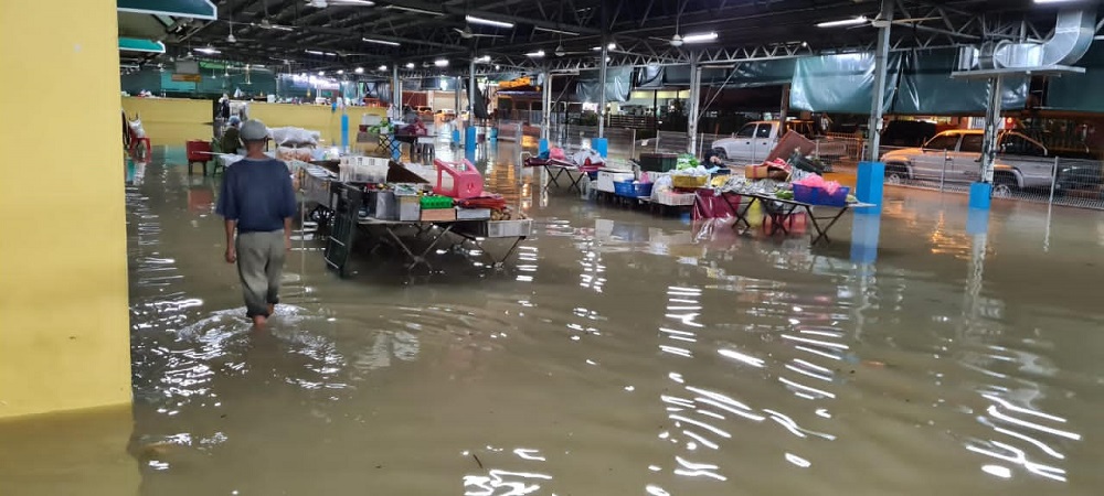 Last night's heavy downpour flooded areas in Penampang, Sabah for the third time in a month. u00e2u20acu201d Picture courtesy of Sabah Civil Defence Department