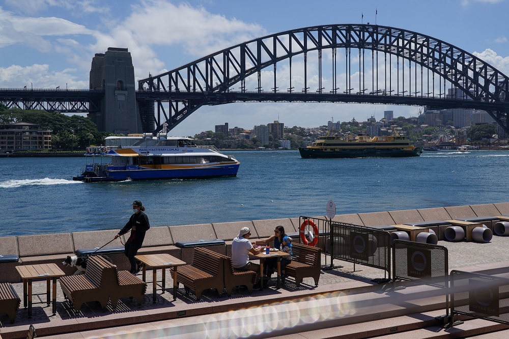 Diners enjoy a meal on the waterfront at Circular Quay in Sydney, Australia October 19, 2021. ― Reuters pic