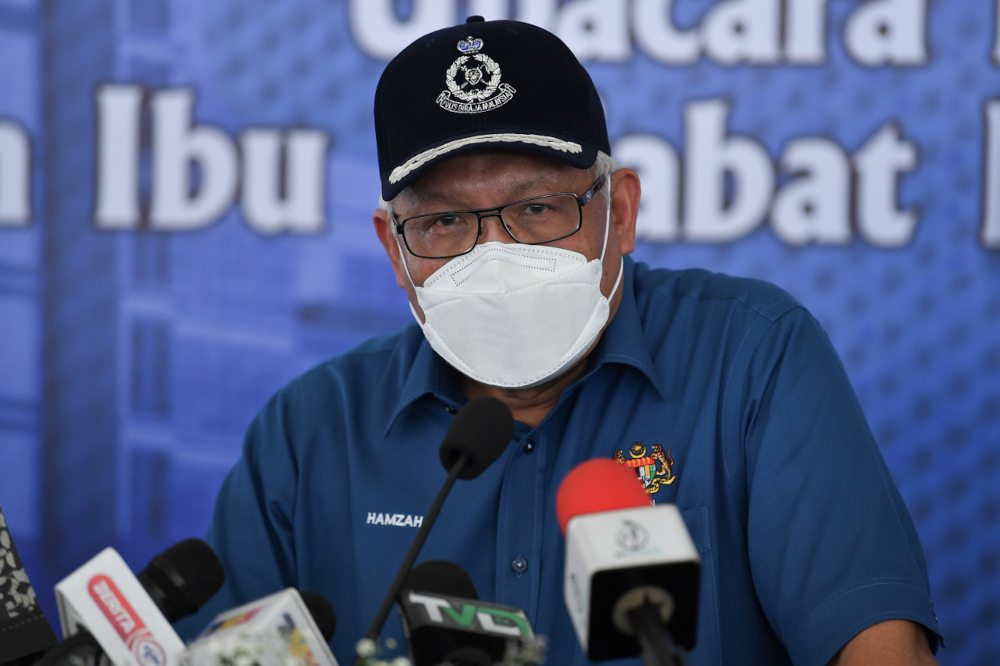 Home Minister Datuk Seri Hamzah Zainudin speaks to the media at the Terengganu Police Contingent headquarters October 4, 2021. — Bernama pic