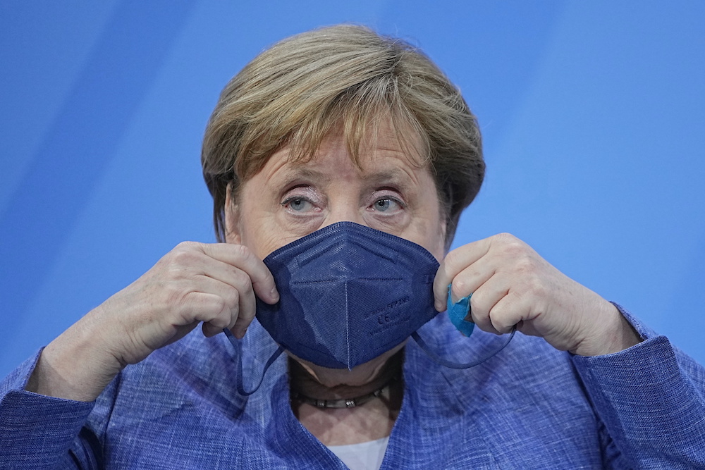 German Chancellor Angela Merkel wears her protective mask after a news conference following a meeting with the leaders of the countryu00e2u20acu2122s 16 federal states to discuss Covid-19 measurements in Berlin, Germany, June 10, 2021. u00e2u20acu2022 Reuters pic