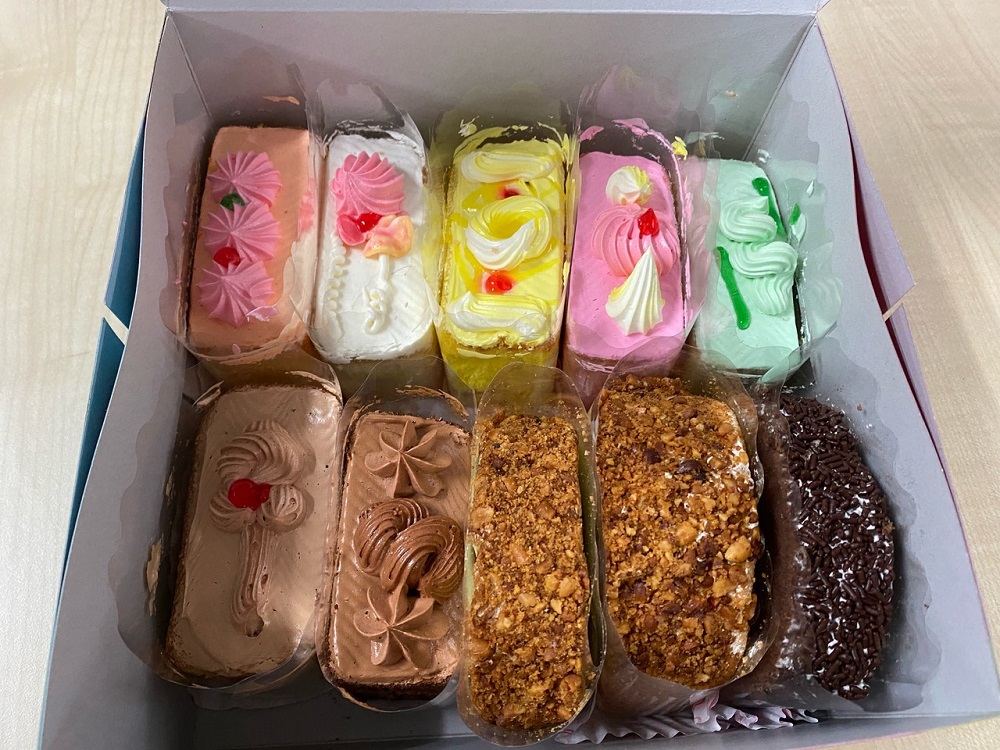 Cut into rectangles, most cakes at Chen Tiang Cake House are immaculately designed with delectable buttercream topping and appear to have the famous 90s flavours such as chocolate, vanilla, and strawberry. — Bernama pic