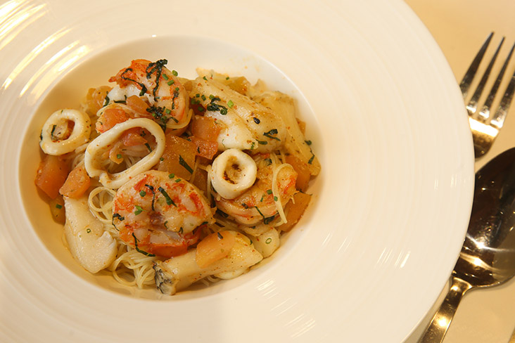 Enjoy the rich flavours of the Seafood Capellini that is laced with prawn oil and served with fresh prawns and fish