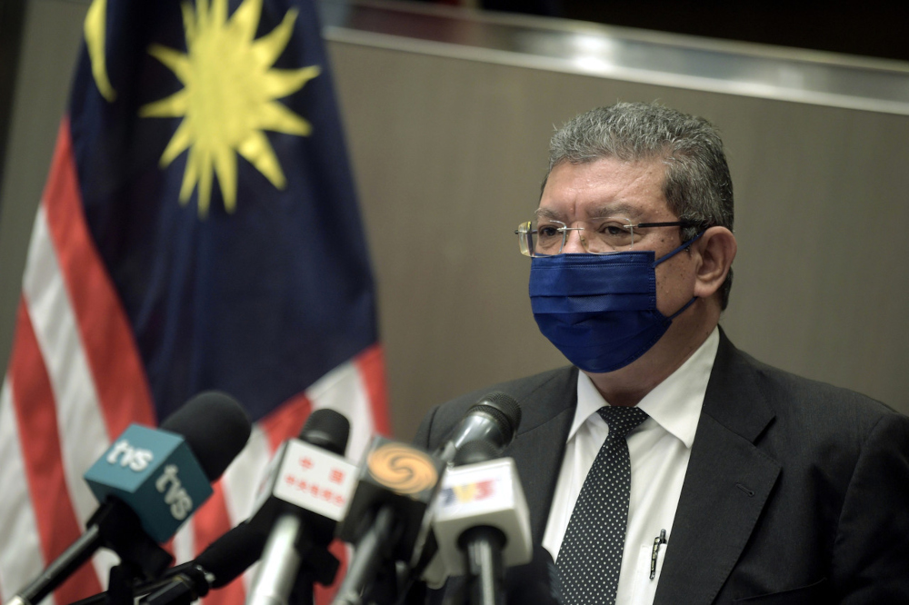 Foreign Minister Datuk Saifuddin Abdullah speaks to the media after the Asean-China Special Summit held via video conferencing in Kuala Lumpur, November 22, 2021. — Bernama pic