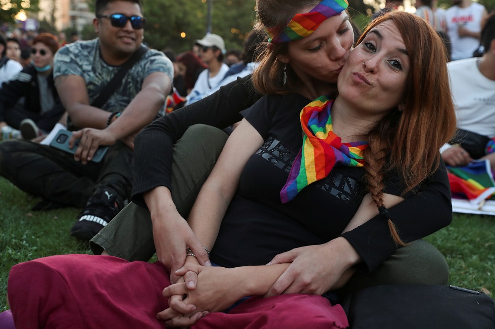 People react after the Senate approved a same-sex marriage bill, in Santiago December 7, 2021. u00e2u20acu201d Reuters pic