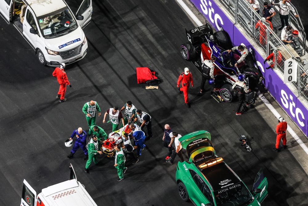 Emergency and medical crews attend to a Formula 2 driver after a crash at the Jeddah Corniche Circuit December 5, 2021. — Reuters pic