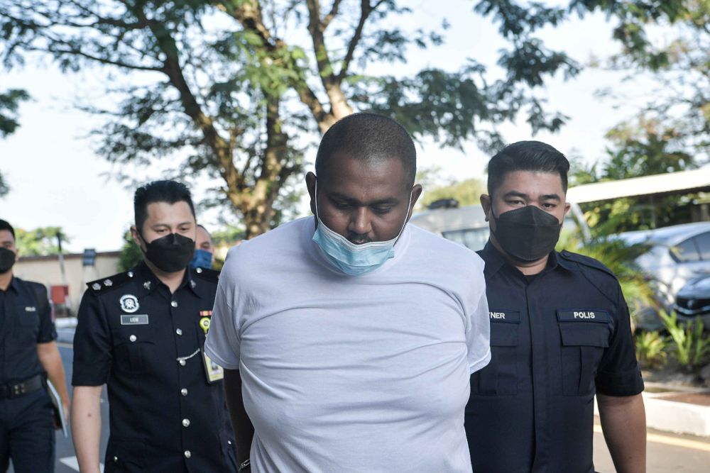 R. Ganesan arrives at the Butterworth Sessions Court to face money laundering charges on December 13, 2021. u00e2u20acu201d Picture by Sayuti Zainudinnnn