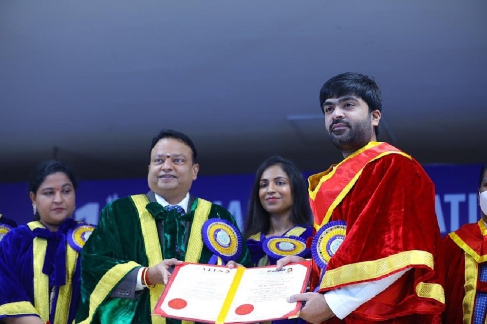 Simbu (in red robe) thanked his fans and family after getting his honorary doctorate from Chennai's Vels University. u00e2u20acu2022 Picture via Instagram/silambarasanofficial