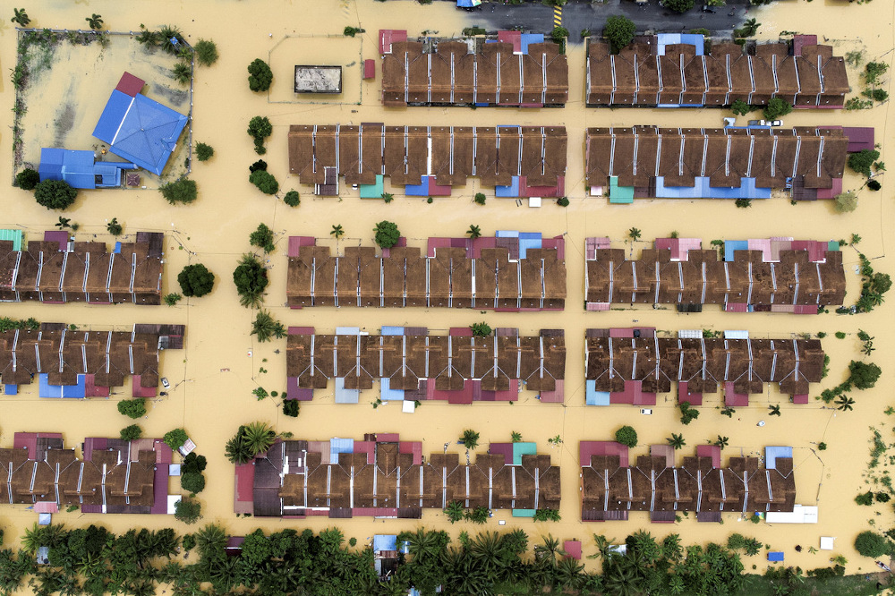 An aerial view of Taman Pinggiran Sungai Kelamah submerged in flood water after heavy rains in Tampin January 1, 2022. u00e2u20acu201d Bernama pic