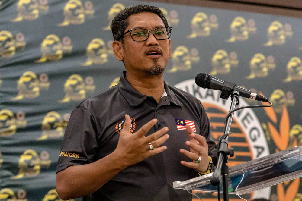 Youth and Sports Minister Datuk Seri Ahmad Faizal Azumu delivers a message to athletes and coaches at the National Sports Council in Bukit Jalil, Kuala Lumpur January 26, 2022. u00e2u20acu201d Picture by Firdaus Latif