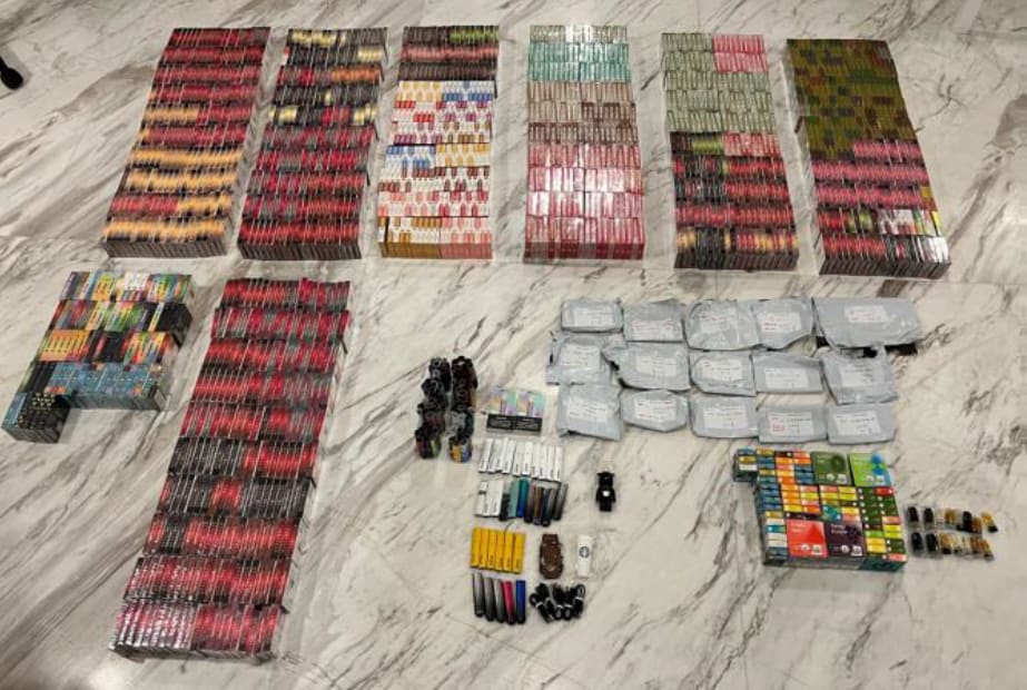Assorted e-vaporisers and pods seized at one of the suspect’s homes. ― Picture via Health Sciences Authority