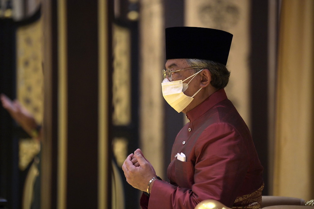 Yang di-Pertuan Agong Al-Sultan Abdullah Riu00e2u20acu2122ayatuddin Al-Mustafa Billah Shah recites prayers at the ceremony to present the instrument of appointment to two judges, Kuala Lumpur February 3, 2022. u00e2u20acu201d Bernama pic
