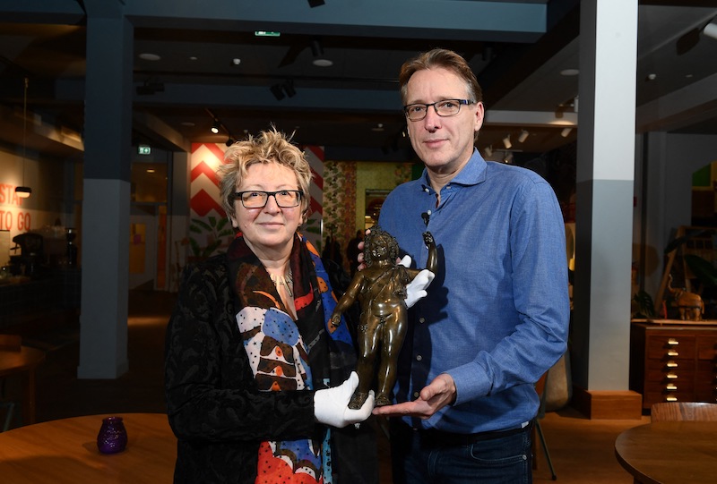 Dutch art detective Arthur Brand (right) hands over the retrieved Roman statue of Dionysus to Catherine Monnet, director of the French museum of Pays Chatillonais, from where it was stolen in 1973 in Amsterdam, on January 31, 2022. u00e2u20acu201d AFP pic