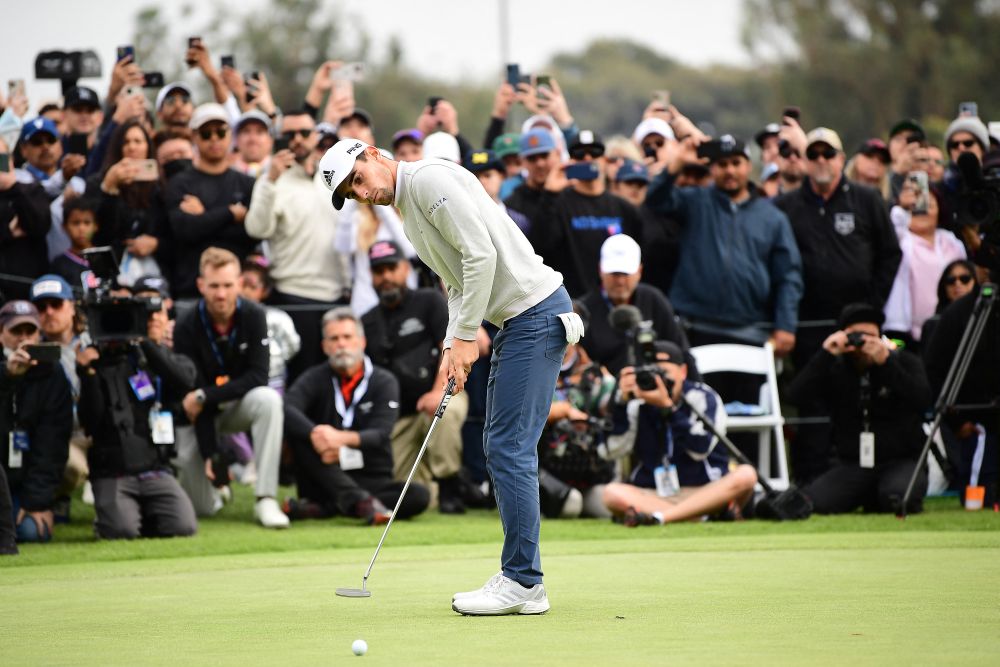 Joaquin Niemann putts on the eighteenth green during the final round of the Genesis Invitational golf tournament in California February 20, 2022. u00e2u20acu201d Reuters picn