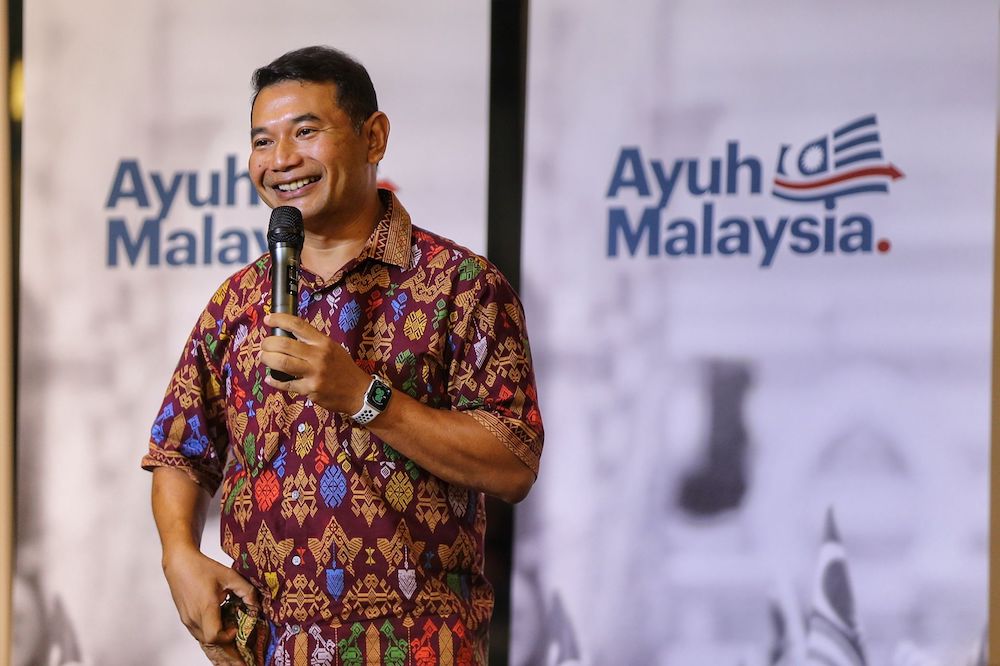 Rafizi Ramli speaks to the audience during the Ayuh Malaysia campaign in Kuala Lumpur March 26, 2022. u00e2u20acu201d Picture by Ahmad Zamzahuri