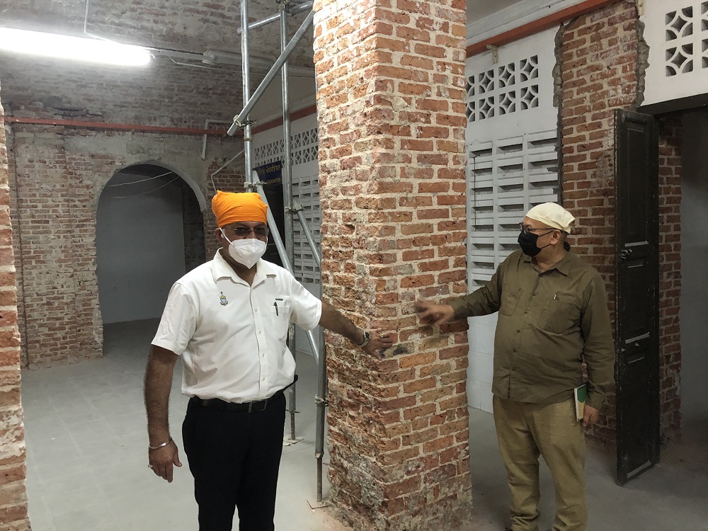 State exco Jagdeep Singh Deo and Penang heritage commissioner Rosli Nor (right) at the Wadda Gurdwara Sahib which is currently undergoing massive restoration works. u00e2u20acu2022 Picture by Opalyn Mok