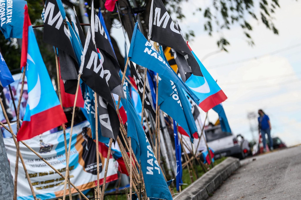 A flag war between the parties contesting in the 15th Johor state election in N44 Larkin, Johor Baru, March 9, 2022. u00e2u20acu201d Picture by Hari Anggara