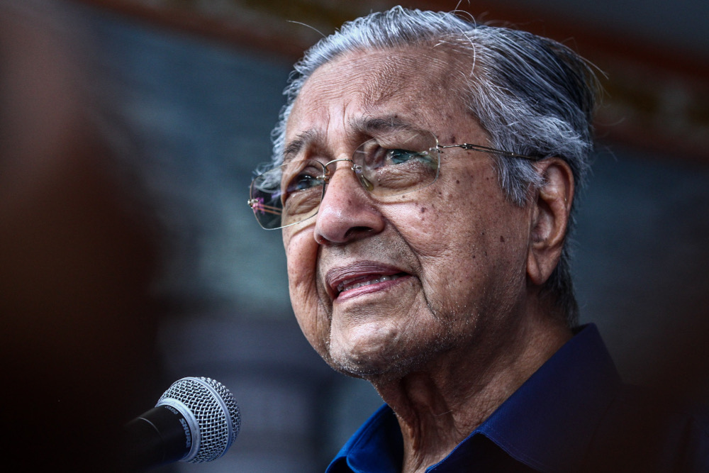 Pejuang chairman Tun Dr Mahathir Mohamad speaks during his visit to Felda Ayer Hitam in Johor March 3, 2022. ― Picture by Hari Anggara