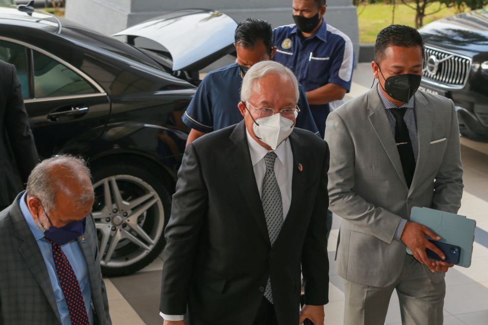 Datuk Seri Najib Razak arrives at the Kuala Lumpur High Court March 14, 2022 . — Picture by Devan Manuel
