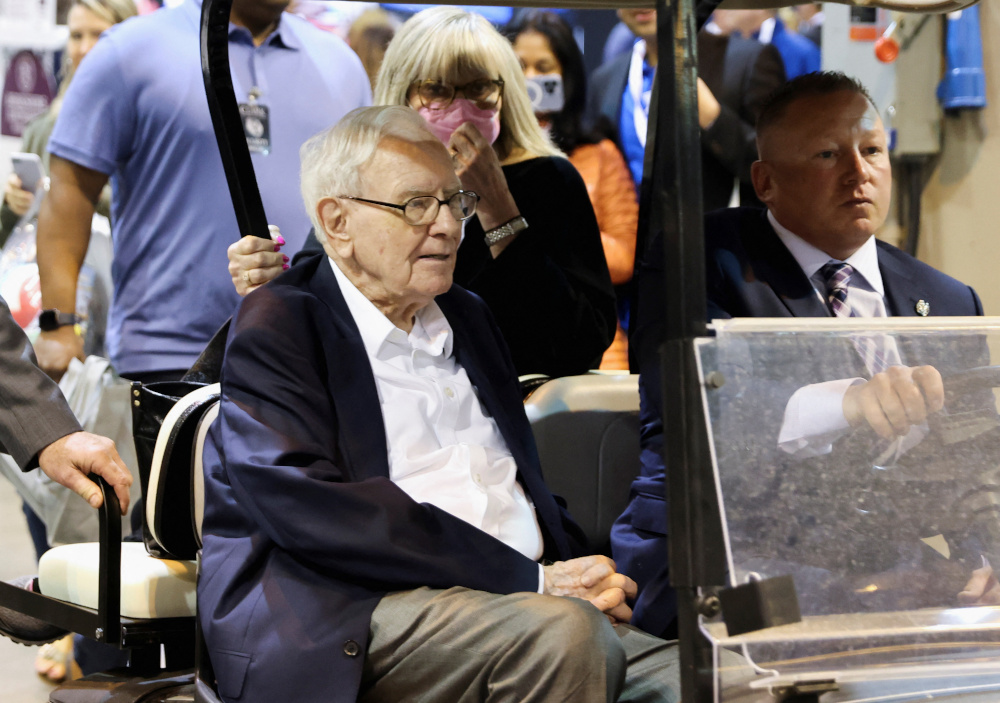 Berkshire Hathaway CEO Warren Buffett rides on a golf cart through the exhibition hall as investors and guests arrive for the first in-person annual meeting since 2019 of Berkshire Hathaway Inc in Omaha, Nebraska April 29, 2022. u00e2u20acu201d Reuters pic