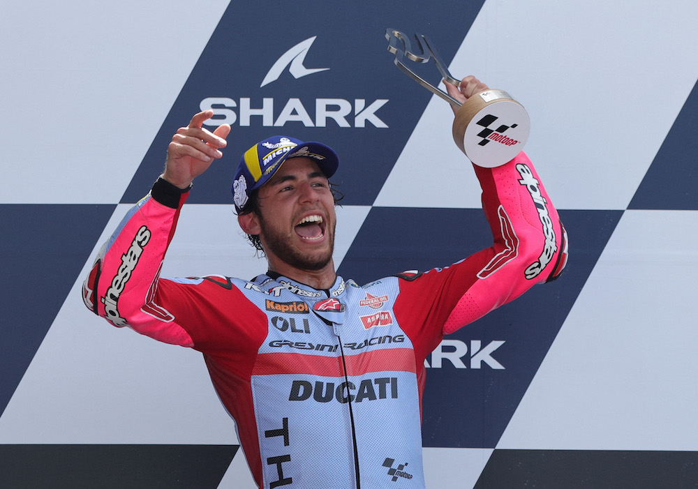 Gresini Racing MotoGP's Enea Bastianini celebrates with the trophy on the podium after winning the MotoGP race, Le Mans May 15, 2022. — Reuters pic