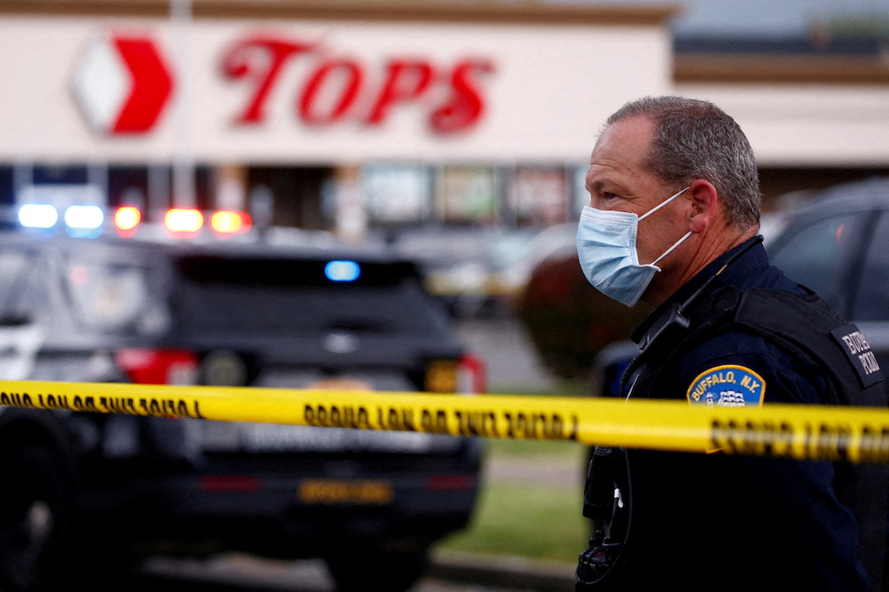 Police officers secure the scene after a shooting at TOPS supermarket in Buffalo, New York May 15, 2022. u00e2u20acu201d Reuters pic
