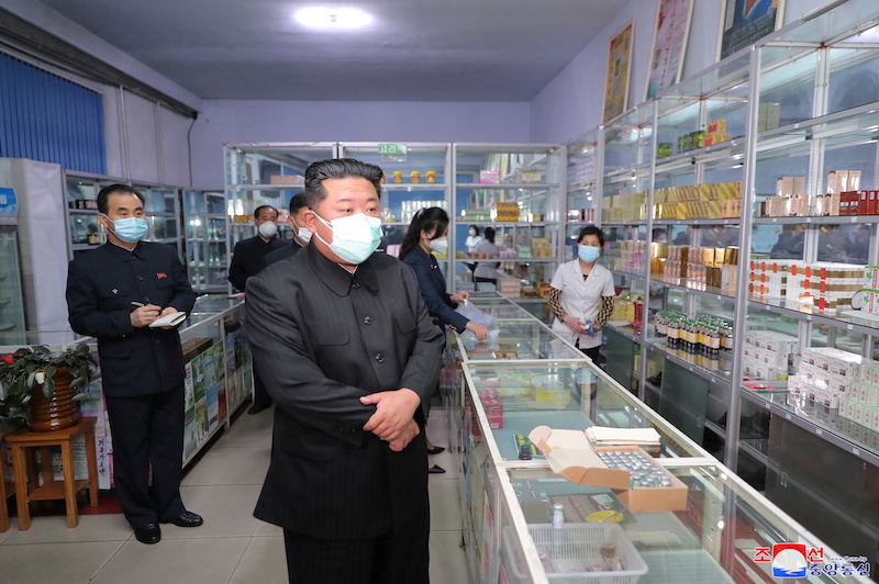 North Korean leader Kim Jong Un wears a face mask amid the coronavirus disease (Covid-19) outbreak, while inspecting a pharmacy in Pyongyang, in this undated photo released by North Korea's Korean Central News Agency (KCNA) on May 15, 2022. u00e2u20acu201d KCNA via R