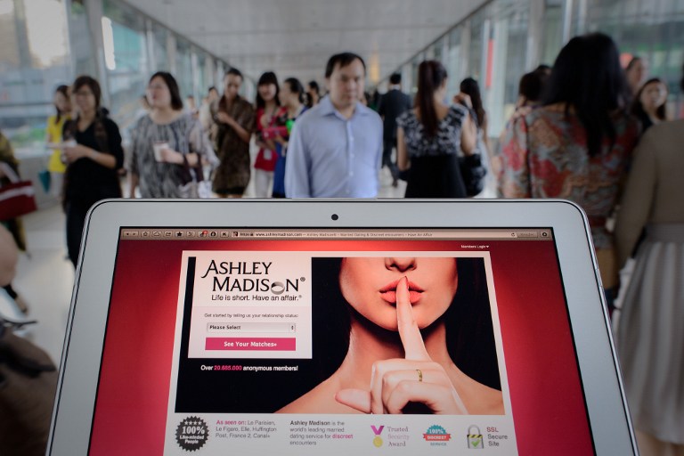 This photo illustration taken on August 20, 2013 shows the homepage of the Ashley Madison dating website displayed on a laptop in Hong Kong. u00e2u20acu201d AFP pic