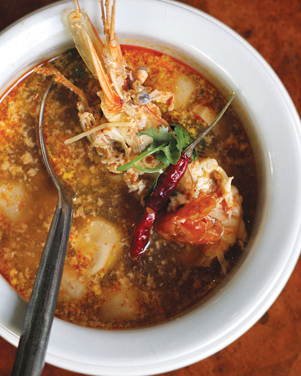 Even the royals enjoy tom yam goong maenam, a spicy river prawn soup with lemongrass, lime juice and garden chillies